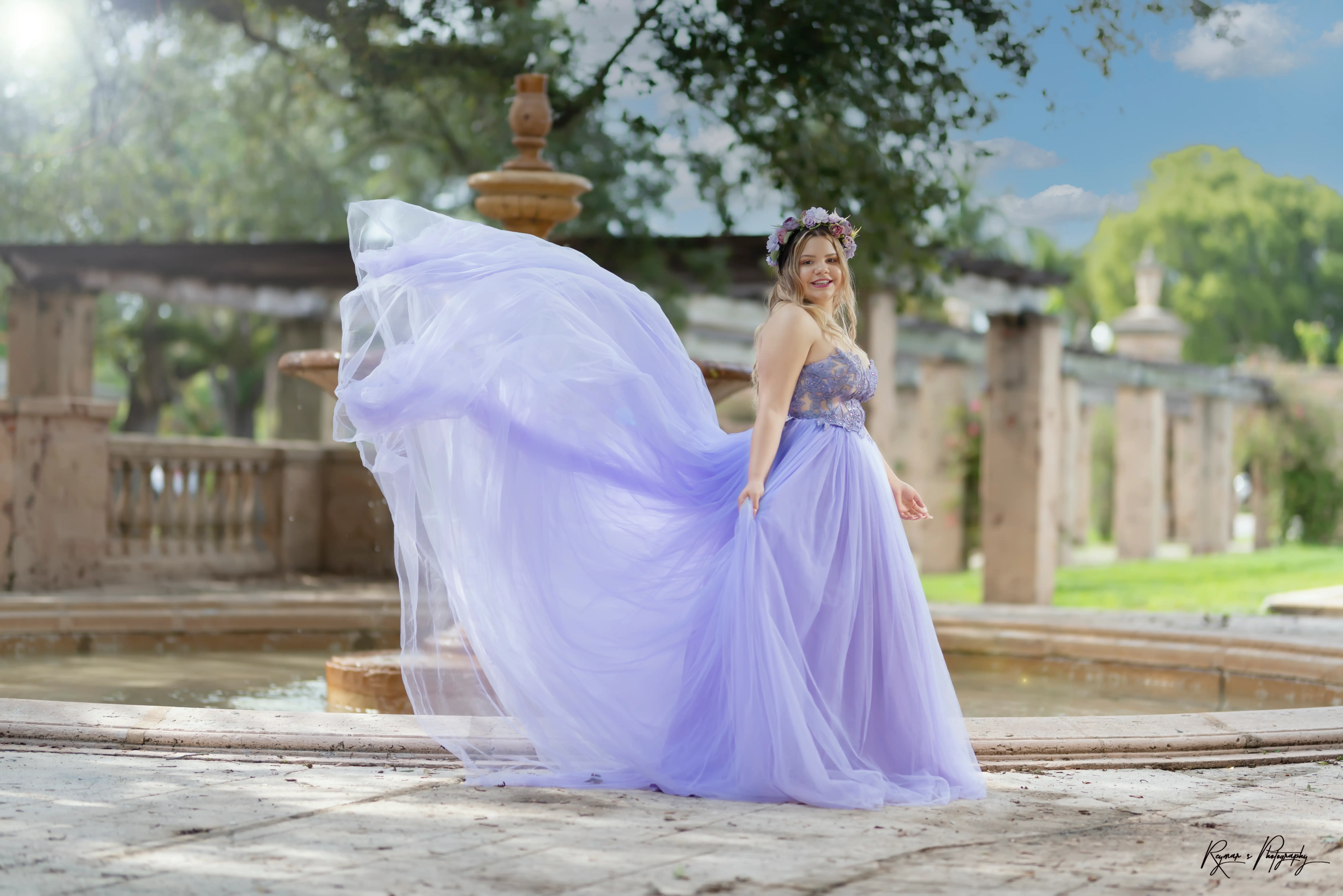 Daniela by the fountain to the left