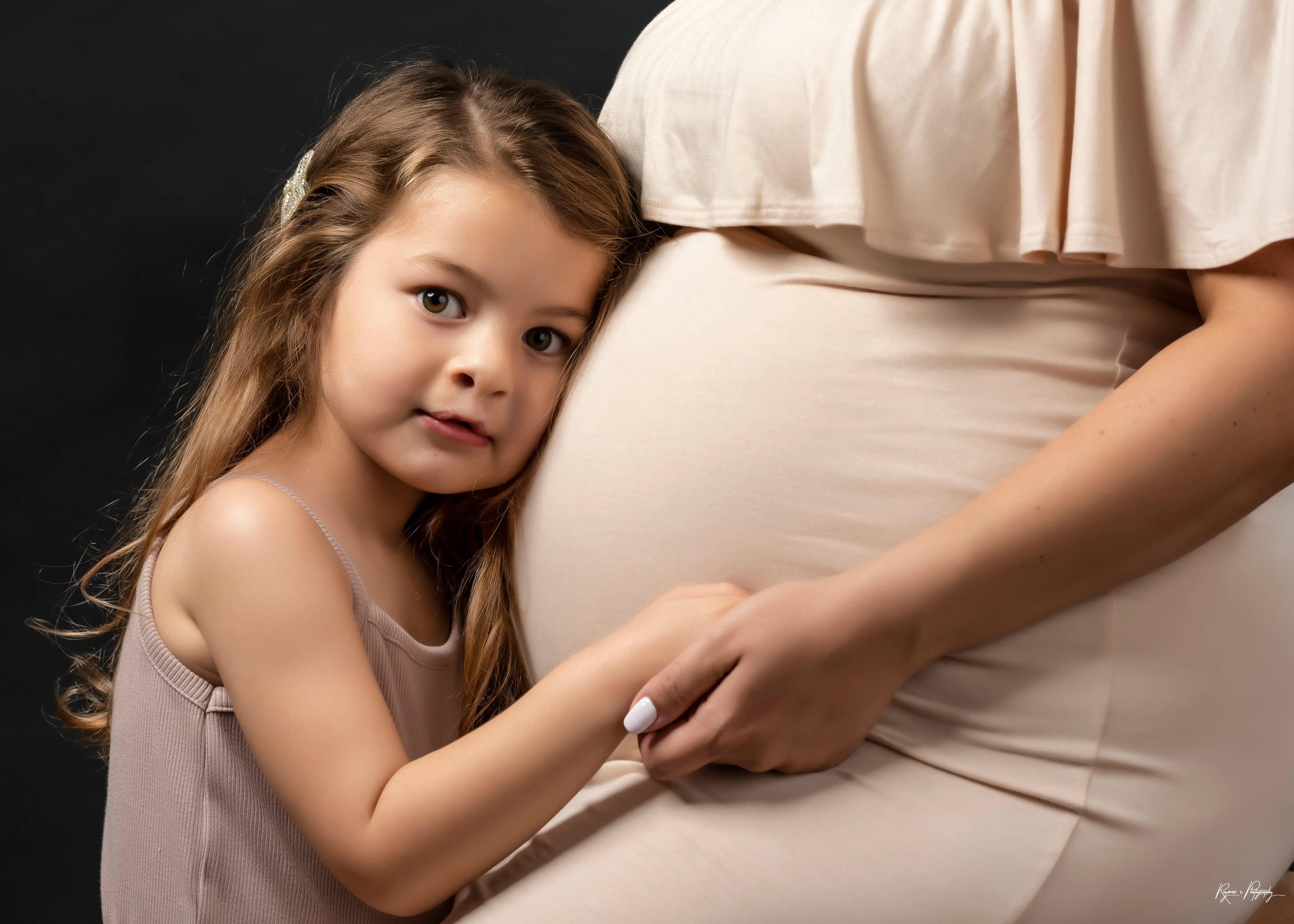 Maternity portrait with Juli on the left